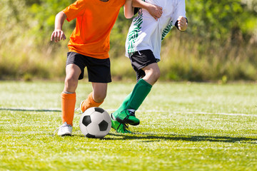 Obraz premium Football soccer game. Boys playing football match