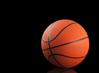Fototapeta premium Basketball ball on black background