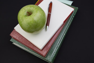 Apple on Top of the Books