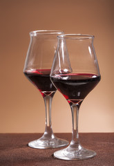 Two filled wineglasses