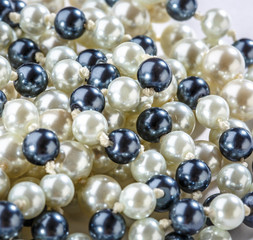 String of black and white pearls