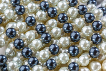 String of black and white pearls