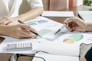 two women discussing business plan