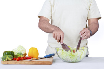 Man preparing vegetables salad
