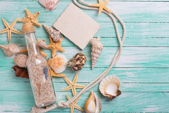 Marine items on wooden background.