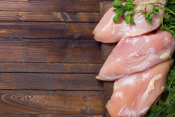 Raw  chicken meat  on wooden table © daffodilred