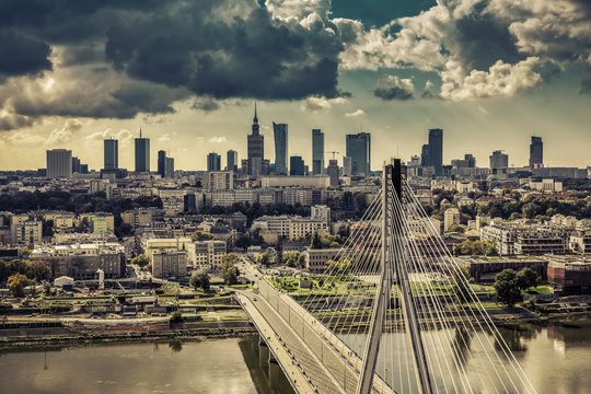 Fototapeta Warsaw skyline behind the bridge vintage view, Poland
