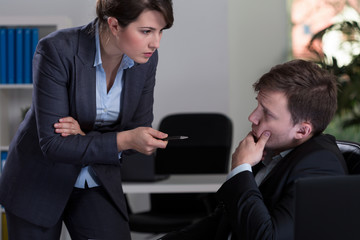 Boss threatening her employee