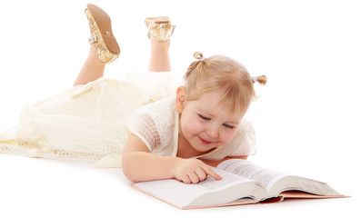 Little girl reading a book