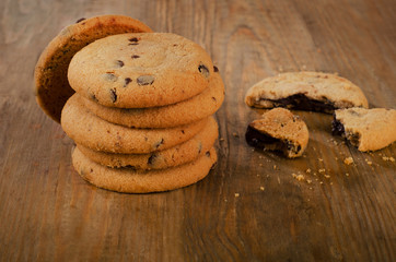 Chocolate chip cookies on  wooden table.