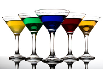 color cocktails in martini glasses