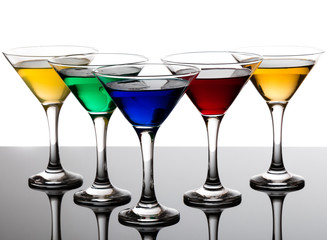 color cocktails in martini glasses