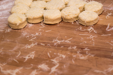 dough on a table with flour