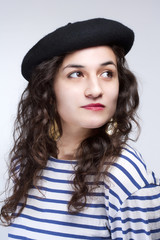 Woman with French Style Beret Hat and Striped T-shirt