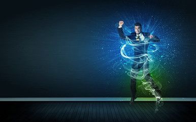 Talented cheerful businessman jumping with glowing energy lines