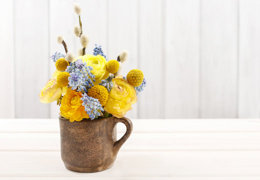 Bouquet of ranunculus (Persian buttercup) and muscari (Grape hya