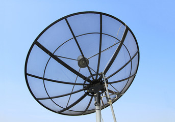 Satellite dish with blue sky background