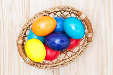Fototapeta na wymiar Basket with easter eggs
