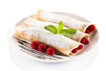 Pancakes with cream and raspberry