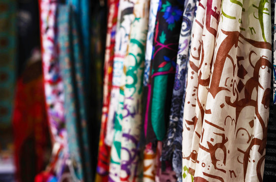 Various Silk Shawls Hanging At Street Bazaar In Istanbul