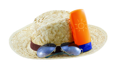 Hat with sunglasses and body lotion isolated on white background