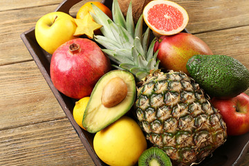 Assortment of fruits on wooden table