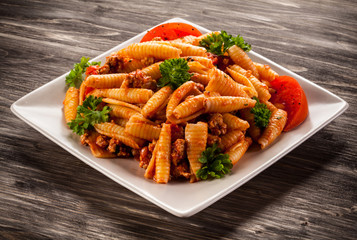 Pasta with meat, tomato sauce and vegetables