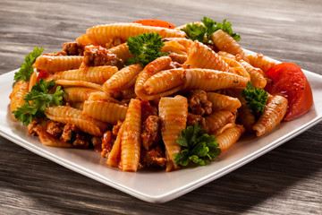 Pasta with meat, tomato sauce and vegetables
