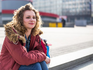Plakat Hipster curly woman smile in the city