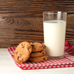glass of milk and tasty cookies