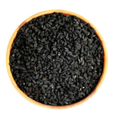 Black sesame in wooden bowl, isolated on white