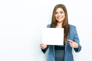 Fototapeta premium Finger pointing. Smiling business woman hold white card.