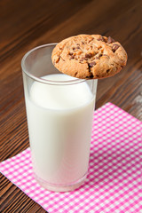 glass of milk and tasty cookies