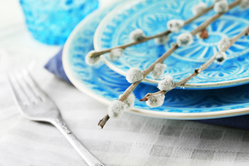 Easter table setting with pussy willow branches