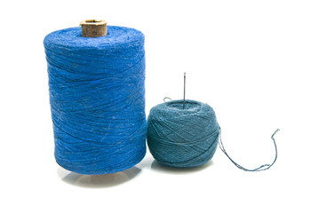ball of yarn and spool of thread