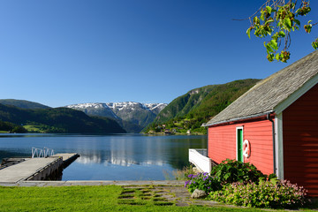 Fjord view with boathouse