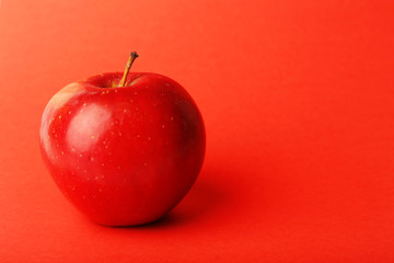 Apple on color background