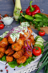Chicken kebab with tomatoes