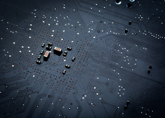 Close up of a printed black computer circuit board