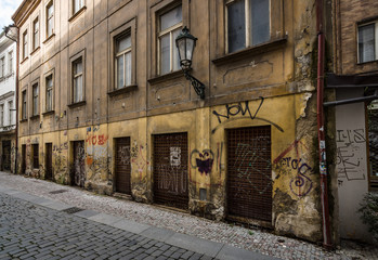 Fototapeta na wymiar Old ragged wall street.