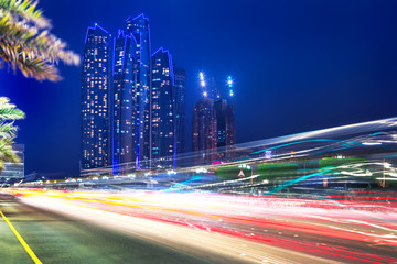 Fototapeta premium Traffic lights on the street of Abu Dhabi at night, UAE