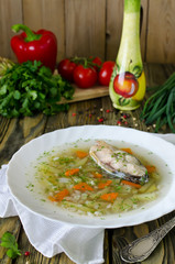 Homemade soup of fish and pearl barley