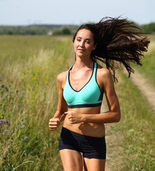 Woman Runner. Fitness Girl Running outdoors
