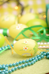 Easter background with eggs, ribbons and spring decoration