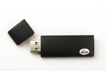 Black aluminium flash drive open cover isolated
