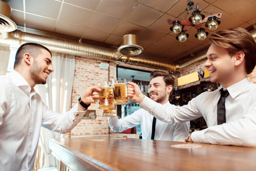Business managers having a drink in the pub