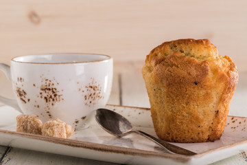 Vanilla muffins and a cup of coffee