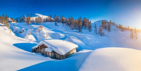 Foto op Canvas Winter landscape in the Alps at sunset with old mountain cottage © JFL Photography