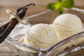 ball of vanilla ice cream on a plate