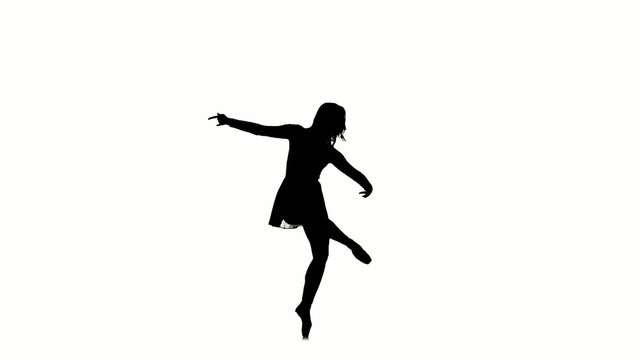Woman ballet dancer isolated on white background, slow motion